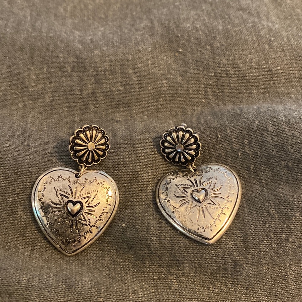 Cute antique silver earrings. Bought but never wore. A little over 2 inch.